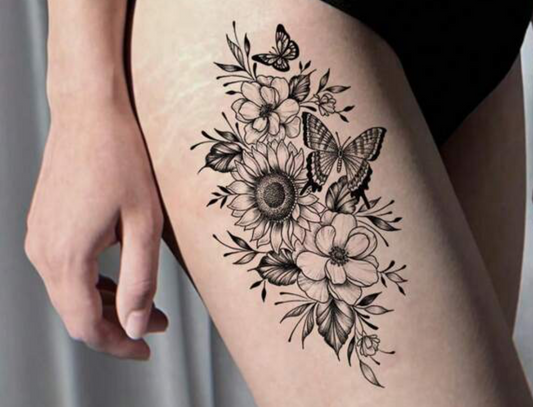 Composition florale avec tournesol et papillons